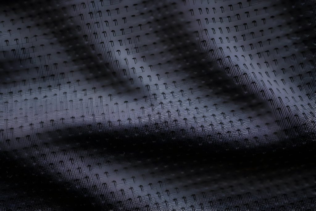 Selection of sportswear materials like moisture-wicking fabrics and their impact on performance